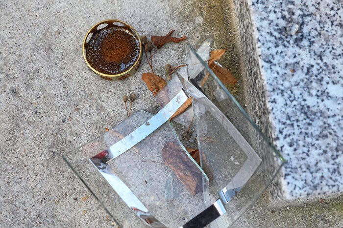 The glass frame containing the photo was destroyed.