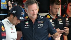 Sergio Perez (links) und Teamchef Christian Horner werden wohl nicht mehr zusammen in eine neue Saison starten. (Bild: AFP/APA/Gabriel BOUYS)