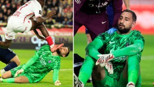 Man kann fast nicht hinschauen: Gianluigi Donnarumma wird voll im Gesicht getroffen.