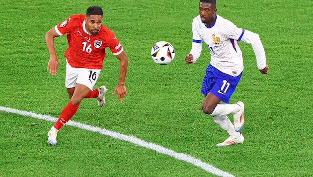 Phillipp Mwene has particularly fond memories of the duel against France with Dembele (right). (Bild: REUTERS)