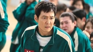 Seong Gi-hun (Lee Jung-jae), der als Spieler 456 das „Squid Game“ der ersten Staffel gewann, will die Hintermänner des fiesen Wettbewerbs finden.  (Bild: © 2024 Netflix, Inc.)