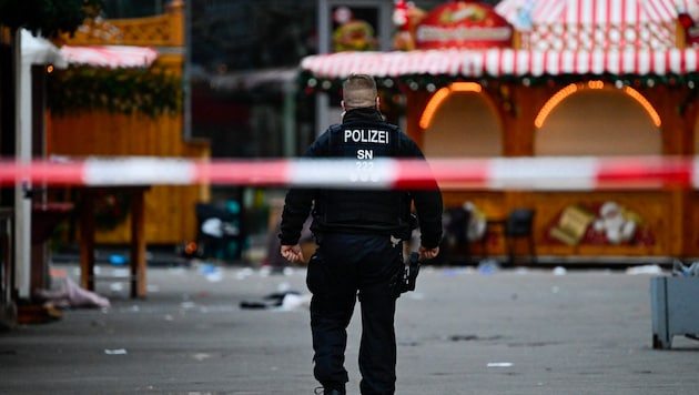 The scene of the horrific act the day after (Bild: APA/AFP/John MACDOUGALL)