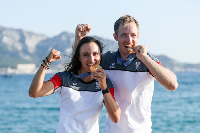 Lara Vadlau (left) sailed to Olympic gold with Lukas Mähr.