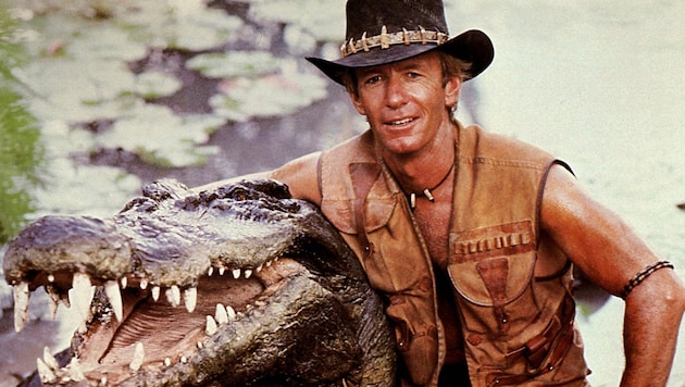 Paul Hogan mit seinem Filmpartner „Burt“ in „Crocodile Dundee – Ein Krokodil zum Küssen“ (Bild: picturedesk.com/Impress / United Archives)