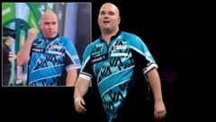 Rob Cross sorgte mit einer obszönen Geste für einen Eklat bei der Darts-WM. (Bild: AP ( via APA) Austria Presse Agentur/ASSOCIATED PRESS, X/NickEFC_)