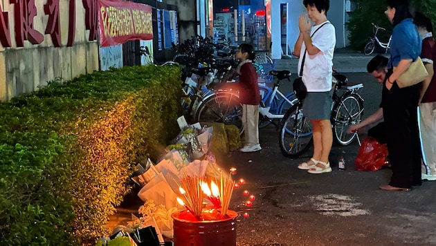 Deep grief and bewilderment after the rampage in Zhuhai (Bild: The Associated Press)