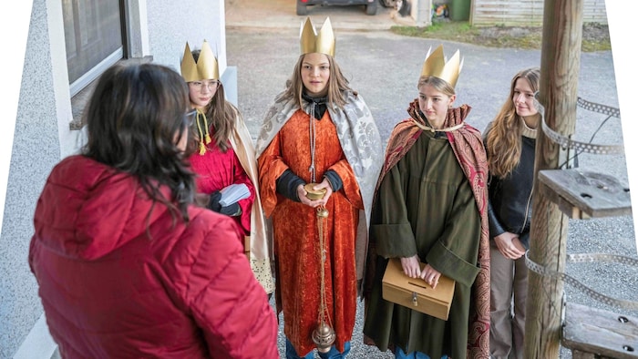 "Peace and blessings in this house", the carol singers begin their "performance".