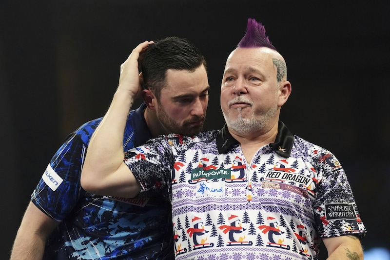 Luke Humphries (li.) verlor gegen Peter Wright. (Bild: PA Wire)