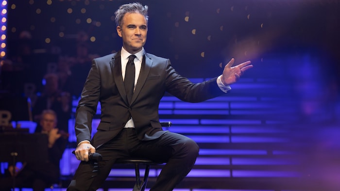 Robbie today: the now 50-year-old is a settled family man - but he's still good at letting his hair down.
