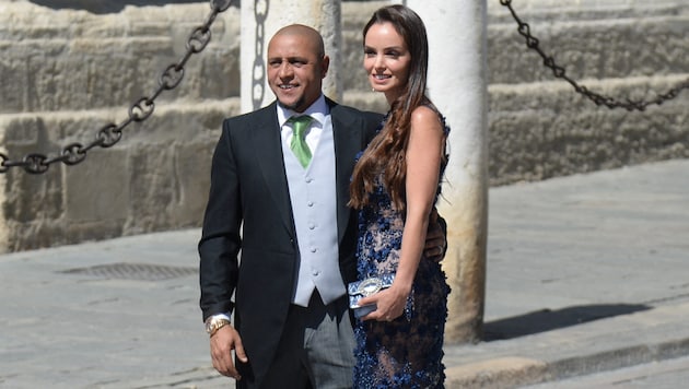 Roberto Carlos and Mariana Luccon are divorcing. (Bild: APA/AFP/CRISTINA QUICLER)