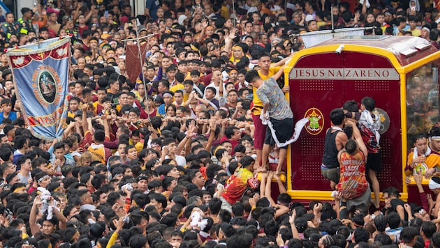 The annual mass spectacle around the Black Nazarene (Bild: APA/AFP )