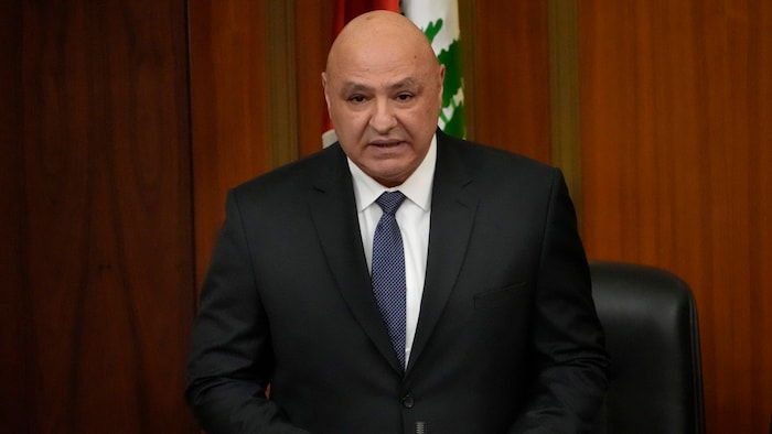 For his first speech in parliament, Aoun had swapped his military uniform for a suit.