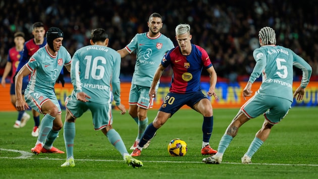 Barcelonas Dani Olmo beim Duell mit Atletico Madrid (Bild: Copyright 2024 The Associated Press. All rights reserved.)