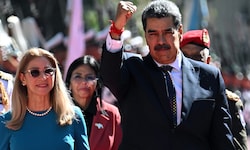 Venezuelas Präsident Nicolas Maduro (rechts) in Begleitung der First Lady Cilia Flores