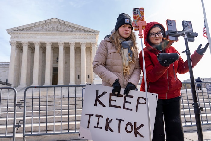 TikTokers Sarah Baus and Tiffany Cianci demonstrate in front of the Supreme Court against a ban on the platform.