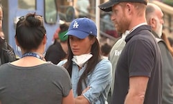 Brände in L.A.: Prinz Harry (re.) und seine Ehefrau Herzogin Meghan unterhalten sich in Pasadena ...