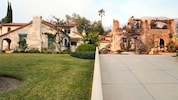 Das aus der Fernsehserie „Beverly Hills 90210“ bekannte Walsh-Haus steht unbeschädigt neben ...