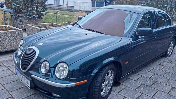 The mayor's private car was covered in paint.
