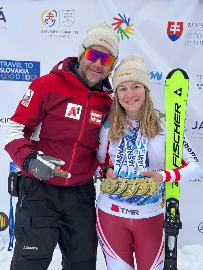 Dad Günther (left) and Melissa Köck celebrated with five gold medals.