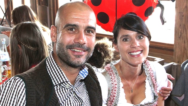 Pep Guardiola und Cristina Serra 2015 beim Oktoberfest (Bild: AFP/AFP PHOTO / POOL / ALEXANDRA BEIER )