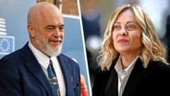 Der albanische Ministerpräsident Edi Rama und seine italienische Amtskollegin Giorgia Meloni (Bild: Krone KREATIV/AFP APA/AFP/POOL/SIMON WOHLFAHRT)