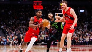 Die Toronto Raptors bezwangen die Boston Celtics um Superstar Jayson Tatum (m.). (Bild: AFP/APA/Getty Images via AFP/GETTY IMAGES/Cole Burston)