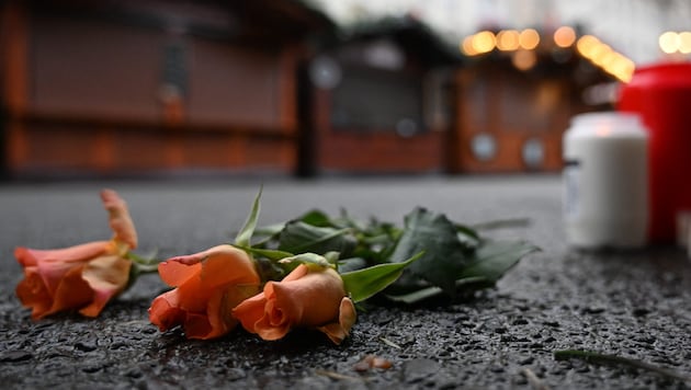 Commemorating the victims of the Magdeburg attack (Bild: AFP/Ralf Hirschberger)