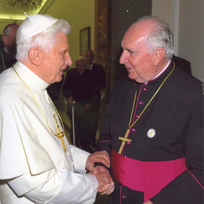 At a meeting with Pope Benedict XVI, who died three years ago.
