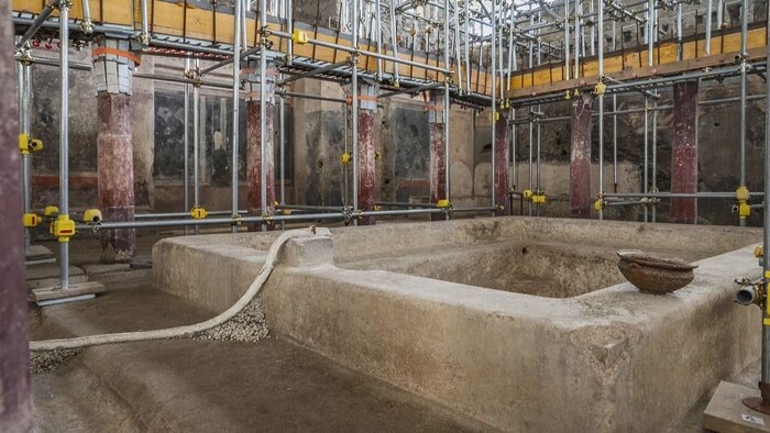 The columned hall of the frigidarium is the heart of the private baths.