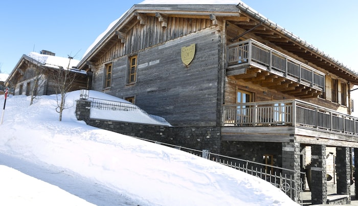 He went skiing in the chalet in Lech.