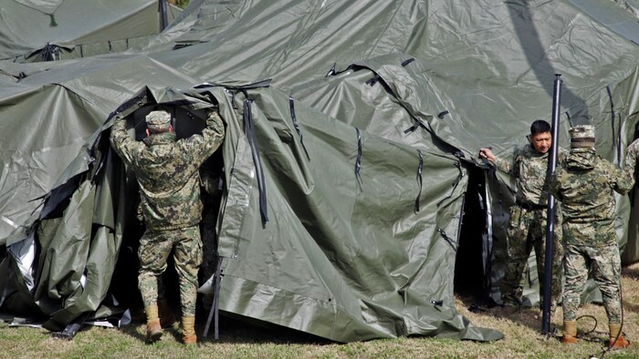Mexico's authorities set up tents at the border.