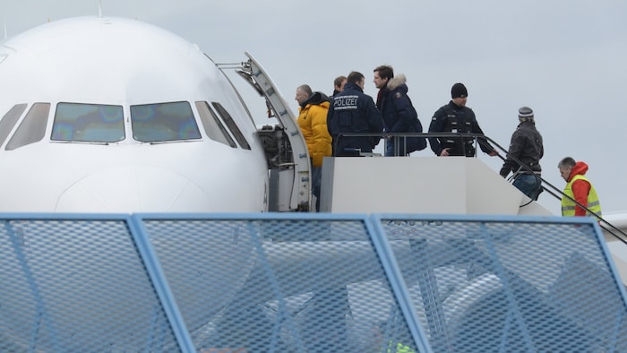 Migrants during their deportation from Germany