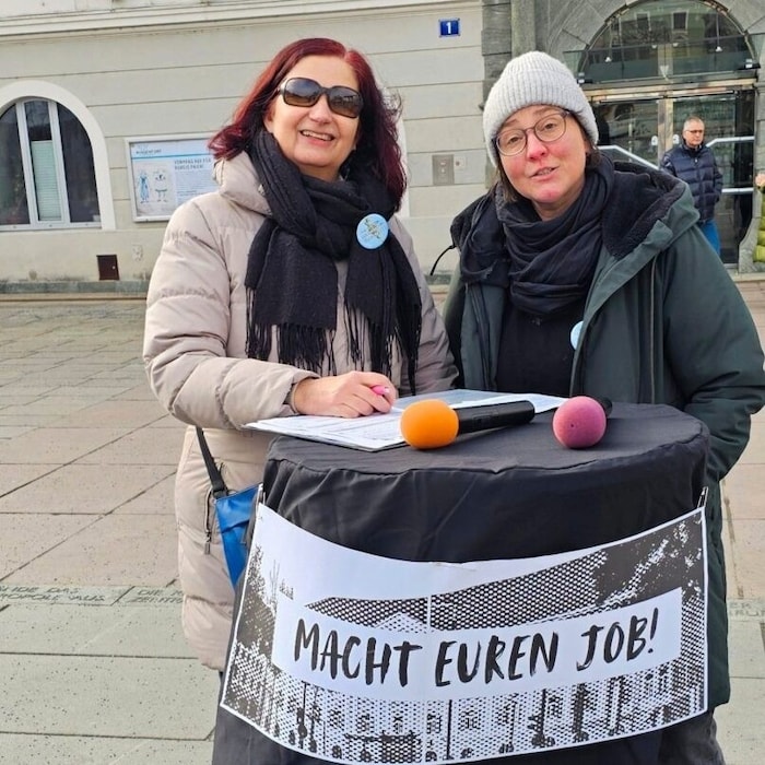 "Do your job," demand the demonstrators.