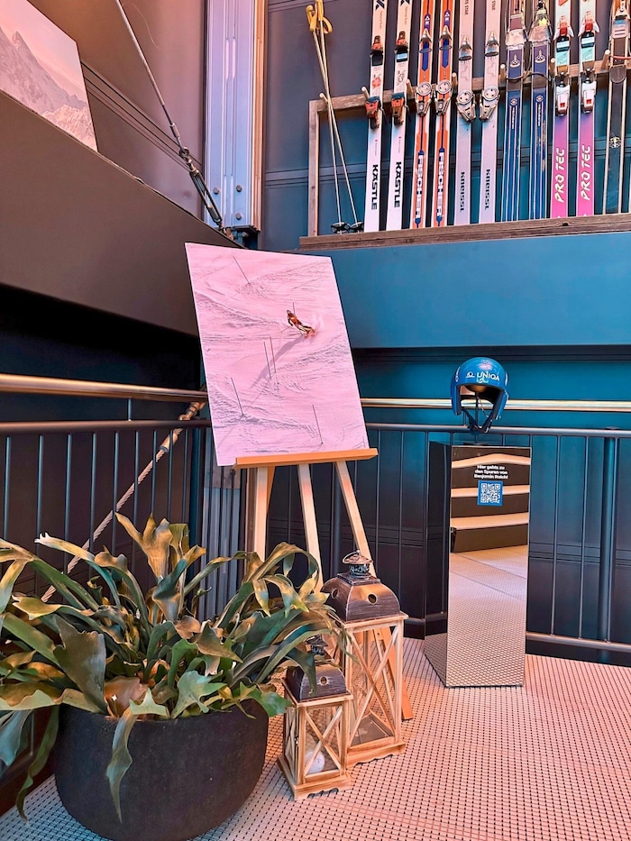 Old skis and helmets of the stars as decoration