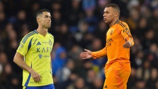Cristiano Ronaldos Aussagen dürften Kylian Mbappe (r.) wohl kaum schmecken.