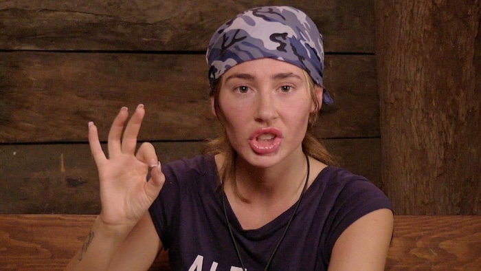 Alessia gets into an argument about the dirty jungle toilet with Edith.