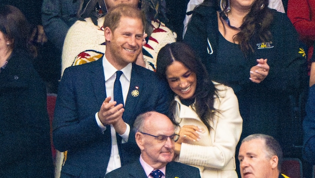 Liebeskrise? Welche Liebeskrise? Bei den Invictus Games turtelten Prinz Harry und Herzogin Meghan die Gerüchte um Ehe-Turbulenzen einfach weg. (Bild: PictureDesk/Dutch Press Photo Agency / Action Press)