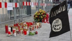 Beim Attentäter von Villach wurde eine IS-Flagge gefunden. Er soll sich via Social Media radikalisiert haben.  (Bild: APA/PETER LINDNER, AFP, Krone Kreativ)