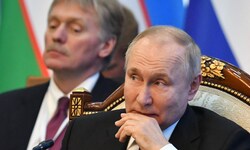 Von links: Kreml-Sprecher Dmitri Peskow und Russlands Machthaber Wladimir Putin