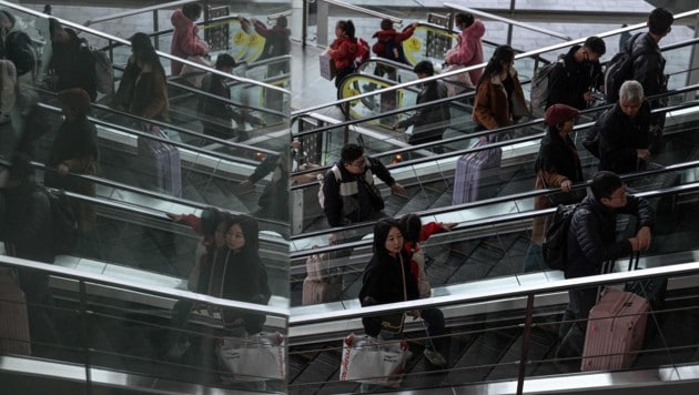 Beamte haben weltweit nicht unbedingt den besten Ruf – in China begegnet man dem nun mit einem ausgefallenen Druckmittel. (Bild: AFP)