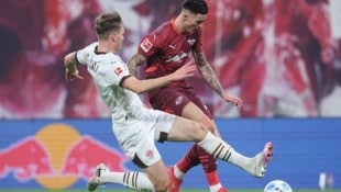 Nemeth grätscht für St. Pauli auch gegen Sesko und Co. (Bild: AFP/AFP or licensors)