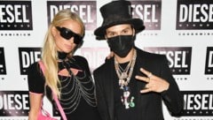 Alec Monopoly, hier mit Richard Lugners Ex-Opernball-Stargast Paris Hilton, wird heuer neben Jacqueline Lugner in der Loge Platz nehmen. (Bild: AFP/GETTY IMAGES/Craig Barritt)