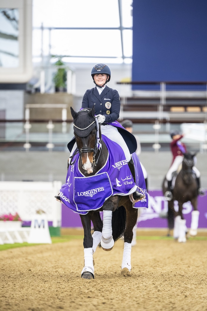 Diana Porsche and Dahoud celebrate a victory in Qatar.