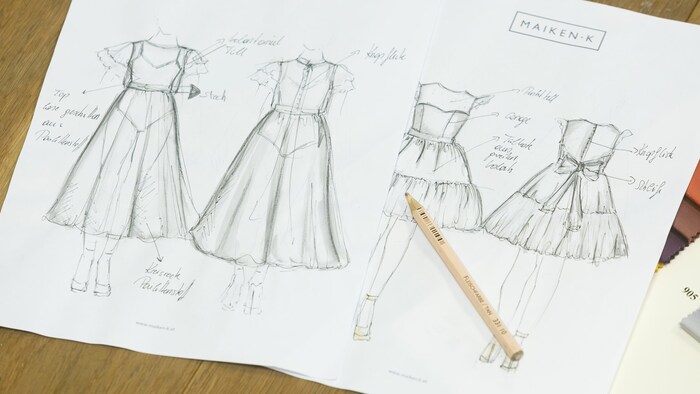 Vom ersten Entwurf bis zum fertigen Kleid sind unzählige Arbeitsschritte zu absolvieren.