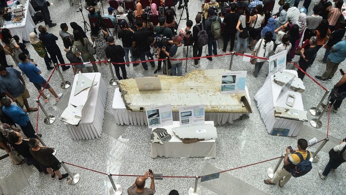 Wreckage that washed up on the shore was exhibited at a memorial event to mark the tenth ...