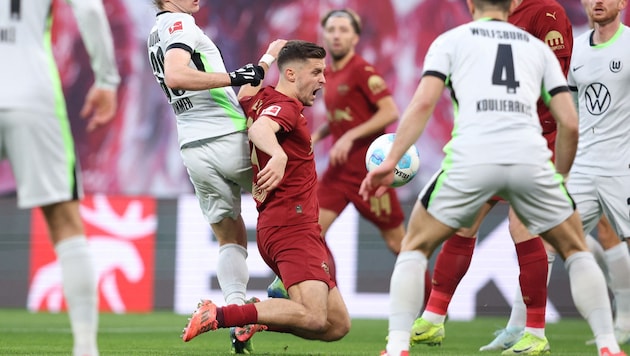 Patrick Wimmer (li.) spielte beim 5:1 im November in Leipzig groß auf (Bild: AFP)