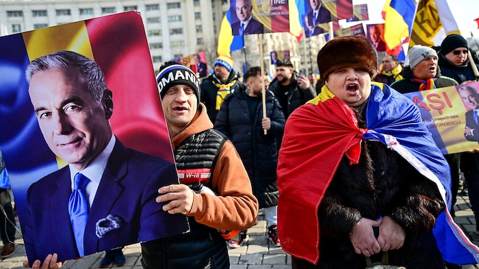 Supporters of Calin Georgescu at a rally for their "president"