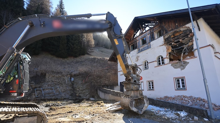 The demolition excavator rolled up on Wednesday morning.