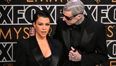 Kourtney Kardashian mit ihrem Mann Travis Barker (Bild: APA/ Frederic J. Brown / AFP)