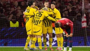 Sieg und Aufstieg ins CL-Viertelfinale – es ist ein gelungener Abend für Borussia Dortmund gewesen ... (Bild: AP/Michel Euler)